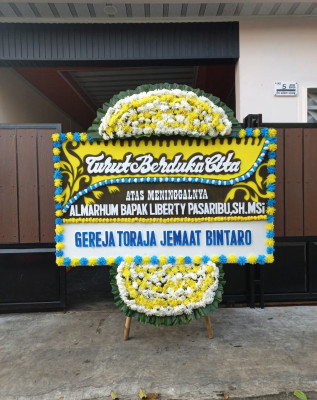 Papan Bunga Duka di Bangunjiwo